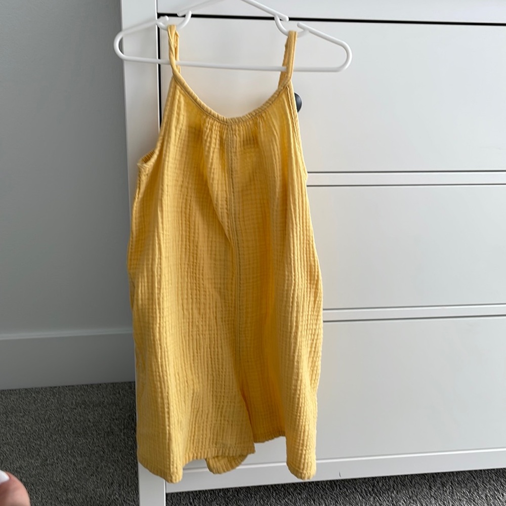 Yellow girls Romper with pockets and bow in the back